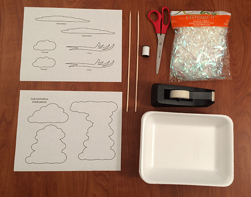 Paper templates, scissors, tape, bowl and other materials 
