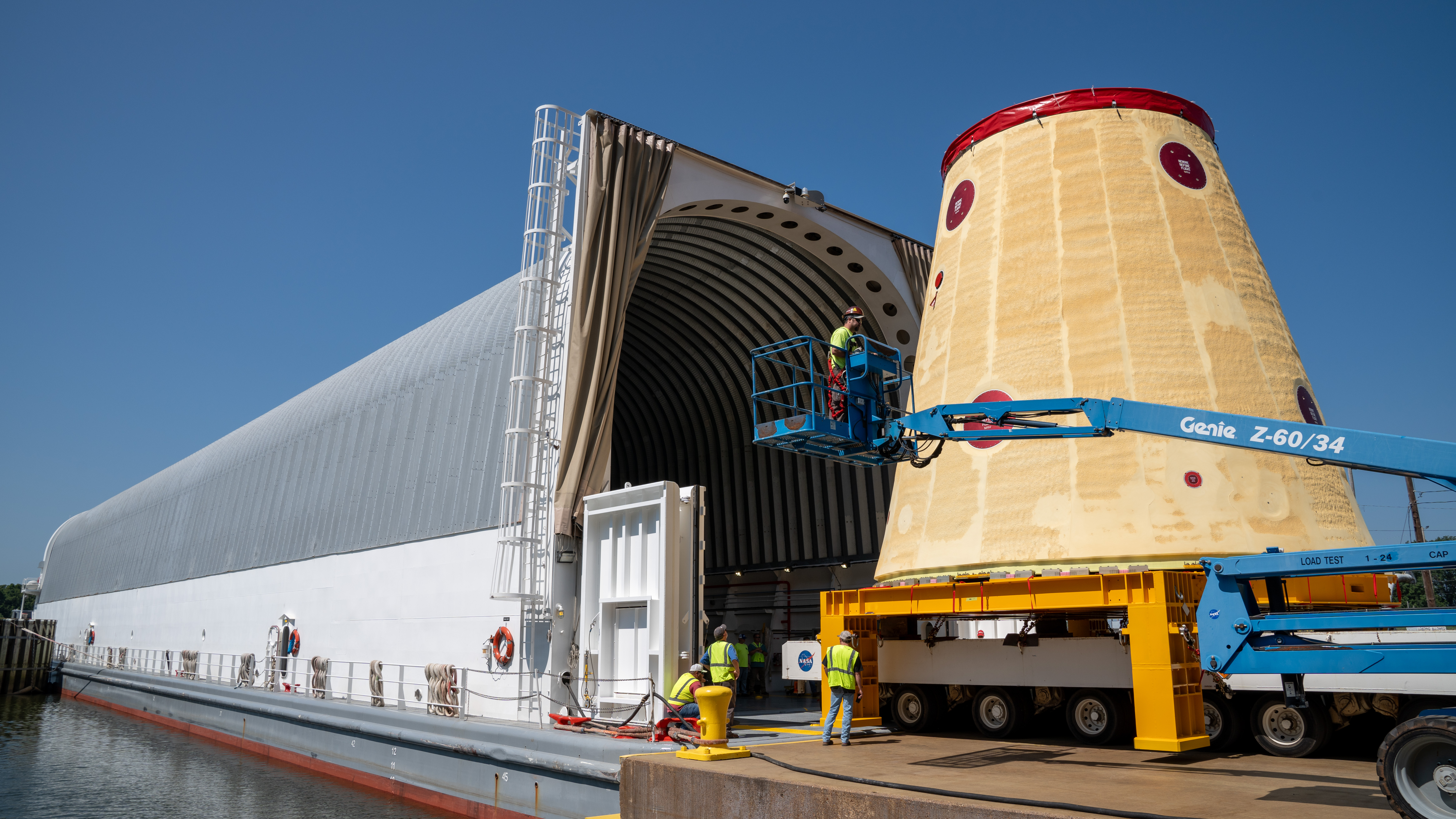 Crews moved the cone-shaped launch vehicle stage adapter out of NASA Marshall’s Building 4708 to the agency’s Pegasus barge on August 21. The b...